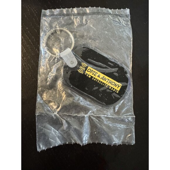 Opie & Anthony Keychain XM Satellite Radio Black & Yellow Retro Memorabilia Seal - Picture 1 of 4